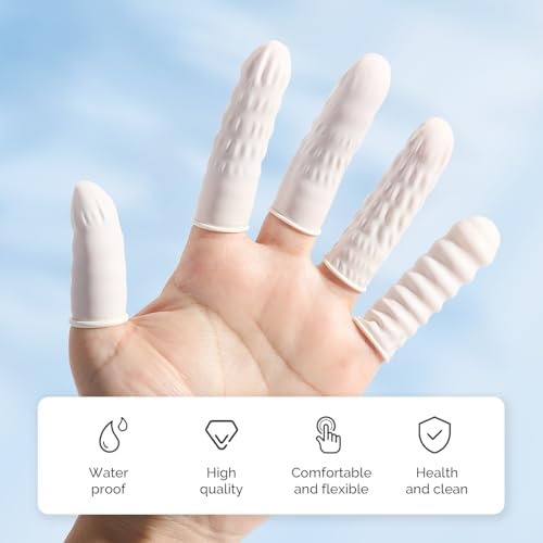 Hygienic disposable rubber finger gloves being worn for precise beauty work