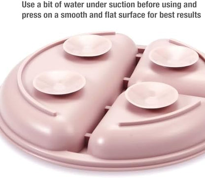 Stack of three PandaEar silicone toddler plates in pink and linen