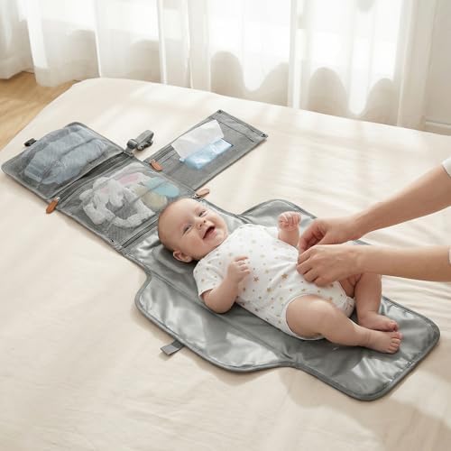 Ubravoo diaper changing pad hanging on stroller handle