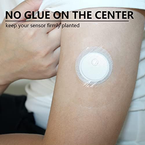 Waterproof transparent overpatch applied securely over a continuous glucose monitor on an arm