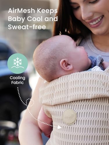 Parent wearing Grownsy ergonomic baby carrier