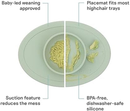 Ezpz silicone suction feeding bowl secured on a white highchair tray