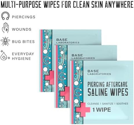 Sterile piercing cleaner wipes being used for daily aftercare routine.