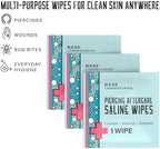 Sterile piercing cleaner wipes being used for daily aftercare routine.