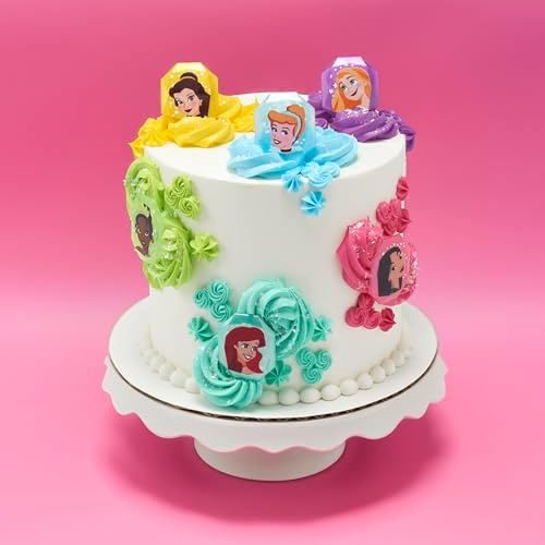 Close up of Mulan and Cinderella cupcake ring toppers