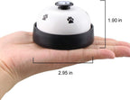 Dog pressing potty training bell with paw