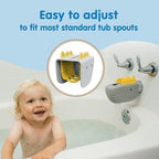 Dino-Soft bath spout cover installed on a standard tub faucet