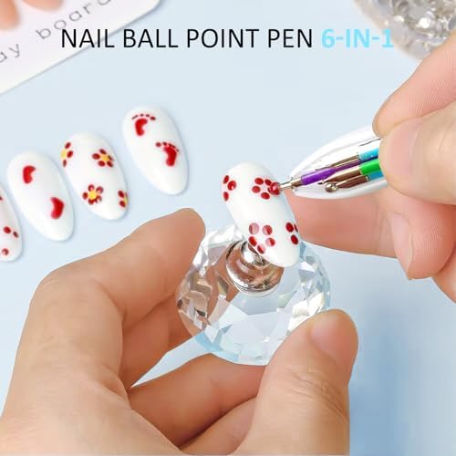 Honey Joy nail art kit dotting pen held in hand