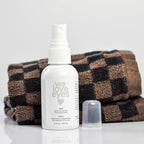 Hypochlorous acid eye spray bottle showing chamomile infusion ingredients.