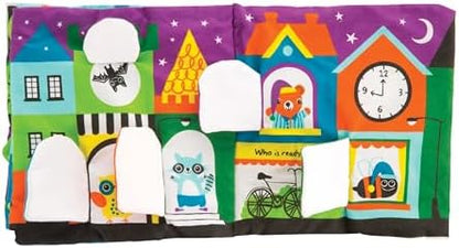 Baby playing with Melissa & Doug The Wonderful World of Peekaboo book