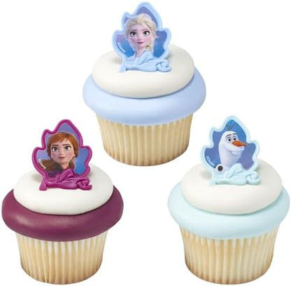Frozen II cupcake rings displayed on a decorated celebration cake