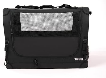 Thule black collapsible dog crate close up of the durable carrying handles and zipper track.