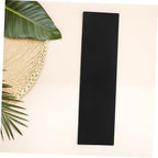 Professional hairstylist holding Safigle highlight board