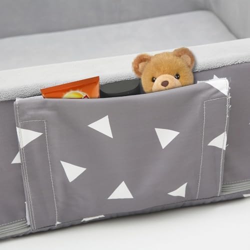 Mooedcoe portable children travel bed showing the high quality grey geometric triangle fabric design.