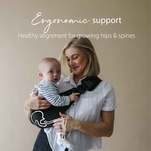 Compact lightweight toddler travel sling folded neatly next to its matching carry bag.