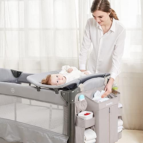 Sweeby diaper caddy hanging on crib view
