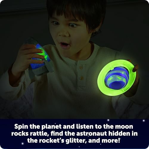 Learning Resources tactile space spinner demonstrating the spinning planet ring and shifting moon rocks.