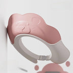 Generic baby shower cap front view showing the pink animal bear design shampoo shield.