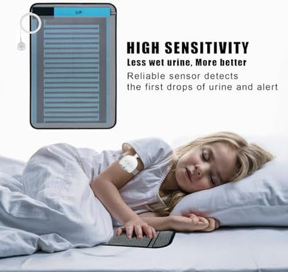 Close-up of the USB rechargeable bedside potty training monitor with volume control buttons.