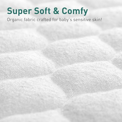 Waterproof changing pad liner placed on peanut shaped nursery table