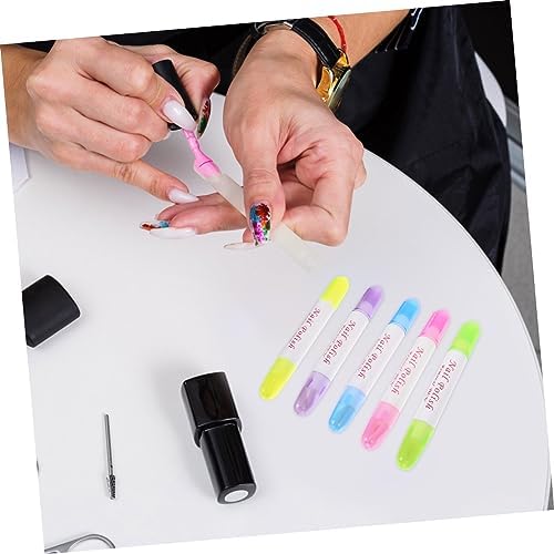 Nail polish corrector pen being used to clean cuticle edge