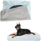 Necesitar elastic fitted pet mattress liner displayed on a large crate pad