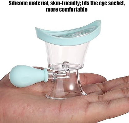 Hand squeezing the manual air pressure bulb of the blue eye wash cup