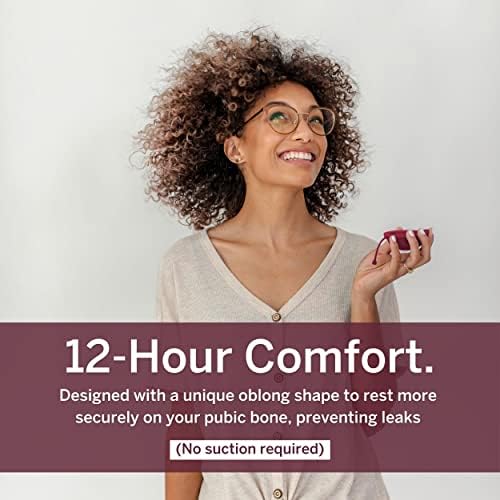 Pixie 2 Menstrual Discs showing medium and large sizes in plum and coral