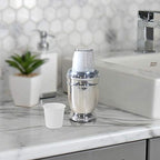 Compact disposable paper cup dispenser with chrome finish
