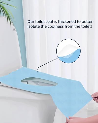 Disposable toilet shield draped over a public restroom toilet seat for full coverage