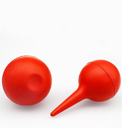 Soft rubber squeeze bulb syringe for veterinary pet nursing and airway clearing.