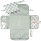 Tiny Twinkle travel baby changing mat unfolded as a clean waterproof changing station.