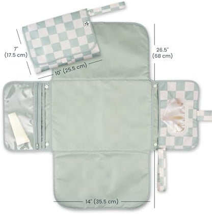 Tiny Twinkle travel baby changing mat unfolded as a clean waterproof changing station.