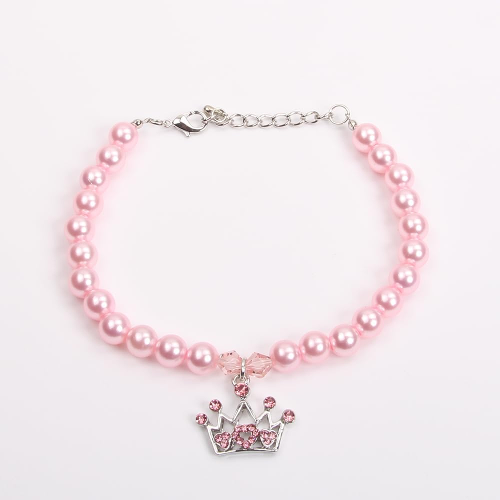 Side view of the pink pearl pet collar showcasing the shiny finish and crown design