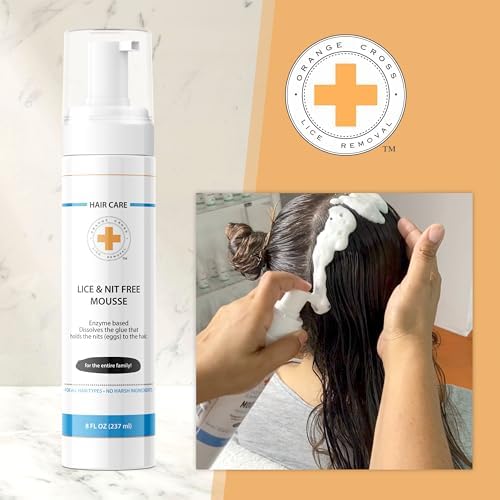Applying lice eliminating mousse to hair for easy nit combing and removal