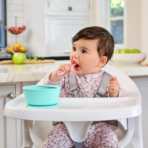 Close-up of the ergonomic handles on the Munchkin baby-led weaning spoon set.