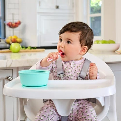 Close-up of the ergonomic handles on the Munchkin baby-led weaning spoon set.