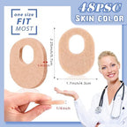 Close up of soft nude colored felt corn protectors with adhesive backing for secure fit.