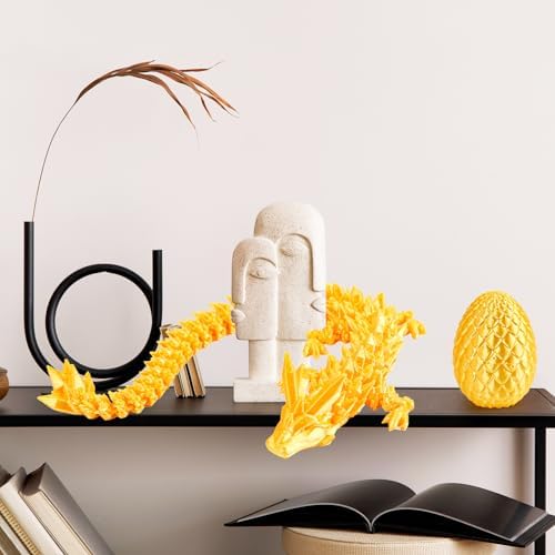 3D printed dragon egg opened to show articulated wings