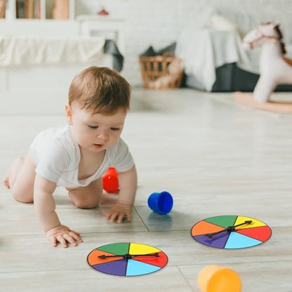 Top down view of Midelong rainbow color math spinners on a desk.