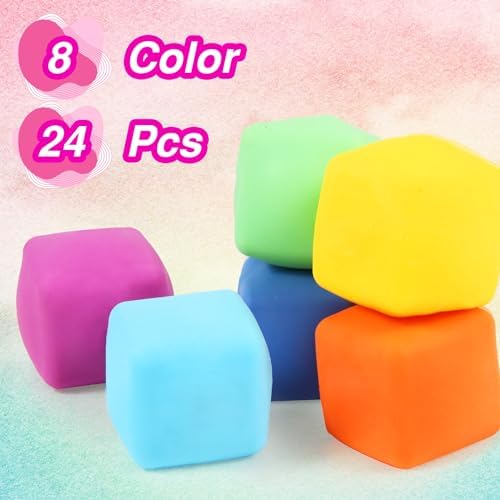 Bulk collection of twenty-four Neec small sensory cubes spread across a desk.
