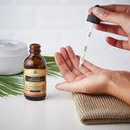 Solgar Vitamin E liquid supplement packaging angle view