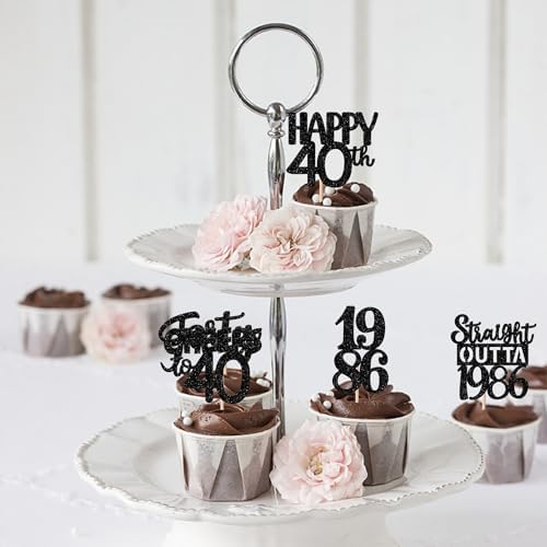 Close up view of black glitter 40th birthday cake decorations
