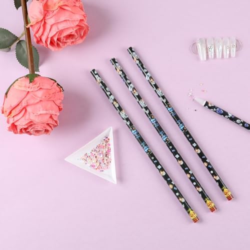 Blulu wax picker pencils being used to lift a single crystal rhinestone from a sorting plate