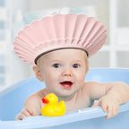 Waterproof baby shower hat showing water droplets sliding off the silicone material
