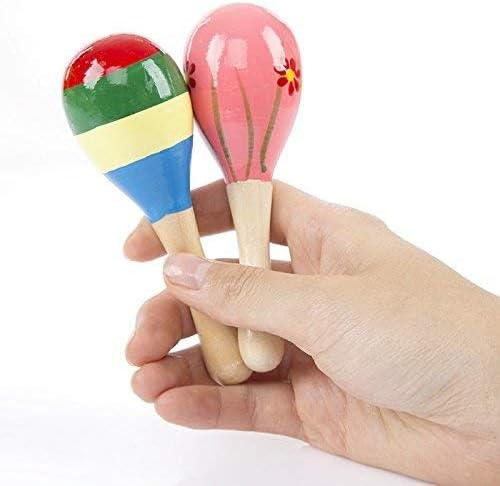 Close up view of the durable wood handle and non toxic paint details on the infant sand hammer toy