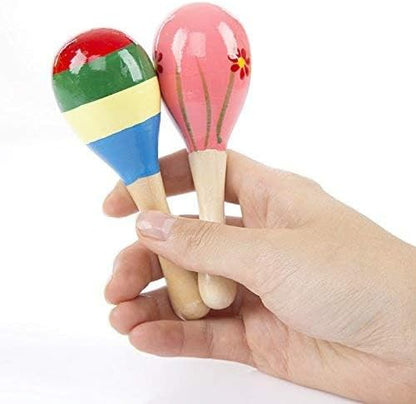 Close up view of the durable wood handle and non toxic paint details on the infant sand hammer toy