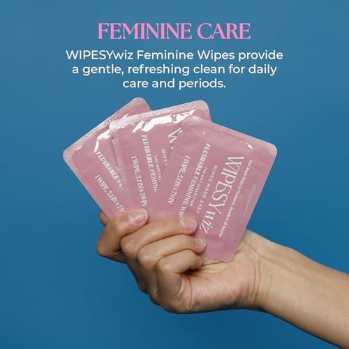 Individually wrapped intimate cleansing wipes for women spread out on a white surface.