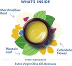 Texture of Motherlove herbal ointment showing the natural beeswax and oil blend.
