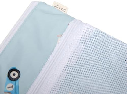 Side profile of Ali+Oli waterproof diaper bag clutch